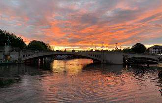 View of Caversham Bridge at sunset.