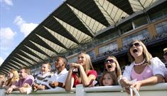 Image of adults and children enjoying the racing at Ascot Racecourse