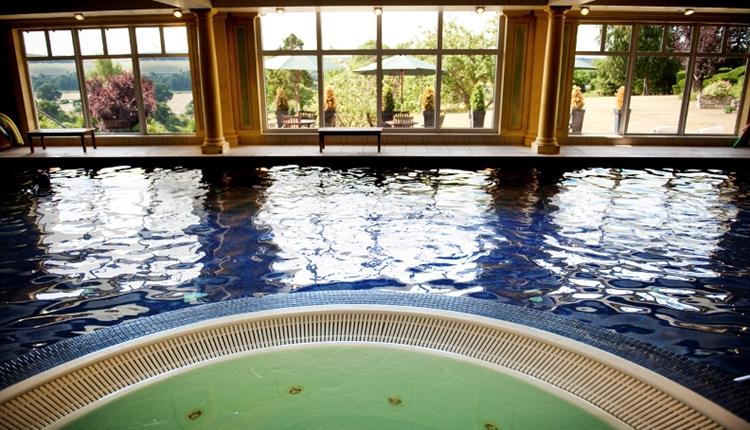 Indoor pool and view to terrace.