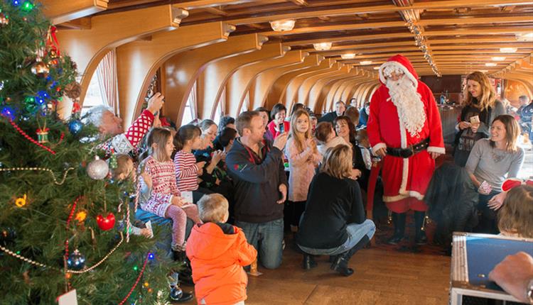 Father Christmas and families on board The New Orleans