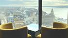 Two yellow seats are placed to look out over the city from the 34th floor, where the restaurant is situated.