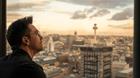 Gino looking out of the Sky Bar towards the city.