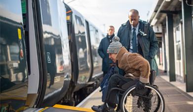 Person in a wheelchair accessing a GWR train, photo by Charlie Budd