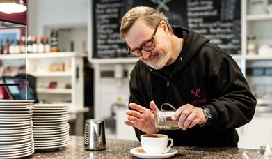 A man making at Hot Chocolate at Beresford Street Kitchen