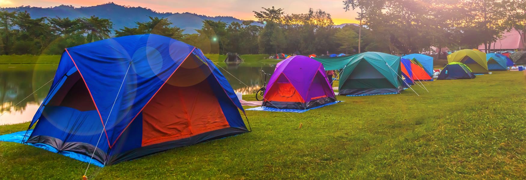 ROW OF BRIGHTLY COLOURED TENTS