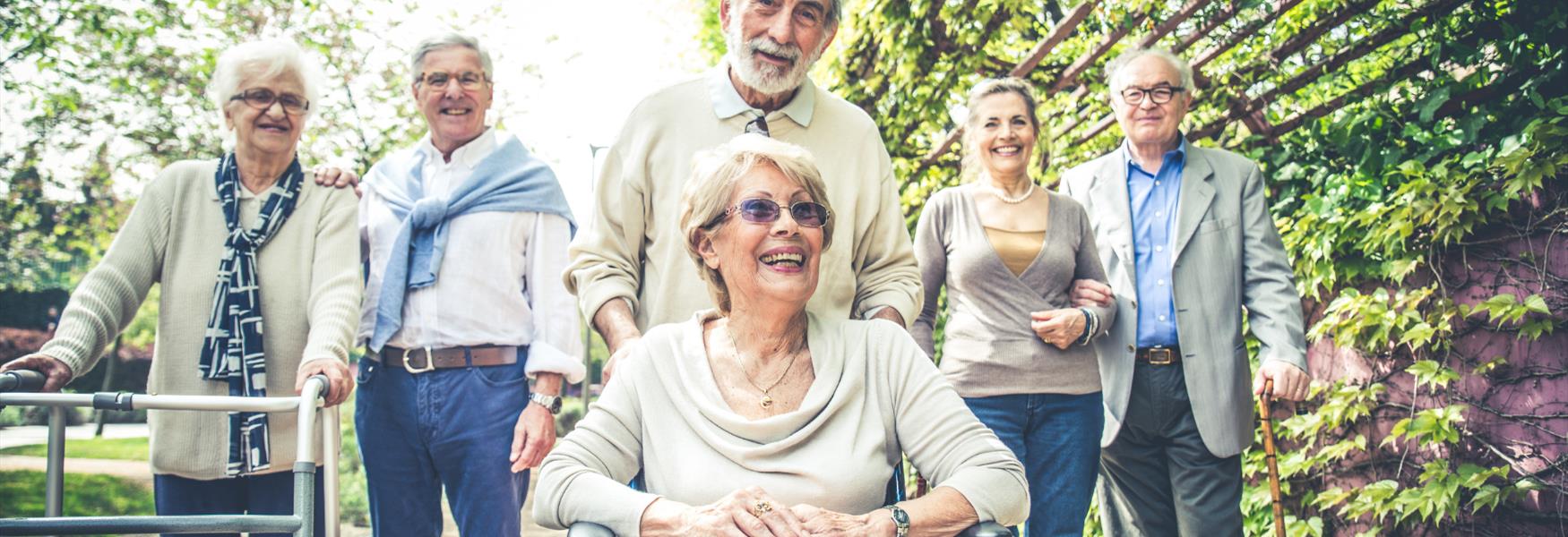 GROUP OF ELDERLY FRIENDS HAVING FUN