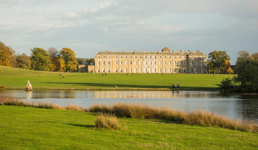 A view across the lake towards the house at Petworth House & Park