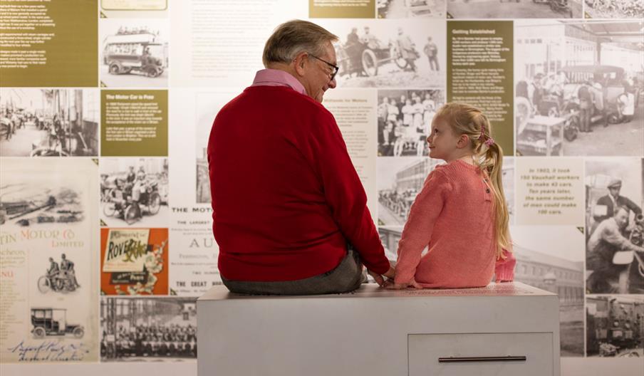 child with grandparent at British Motor Museum