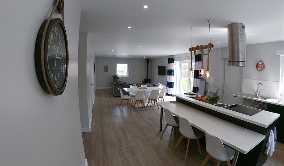 Open plan lounge, kitchen and diner at Coastal Cottage