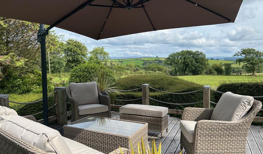 Outdoor seating area with countryside views
