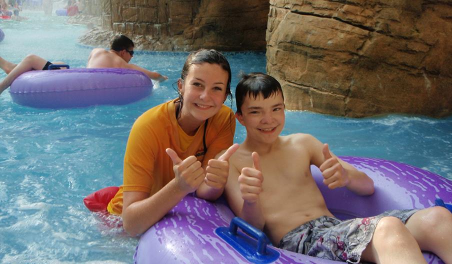 A group of people on the flumes at Sandcastle Waterpark