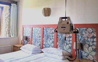 Kingfisher Barn bedroom hired hoist in place in lodge bedroom