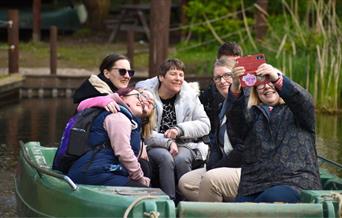 people on a boat at WWT Martin Mere Wetland Centre