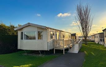 Adapted caravan with wheelchair ramp in the sunshine at Beverley Holidays