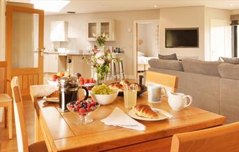 table laid for breakfast at The Granary, Larkbeare Grange