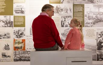 child with grandparent at British Motor Museum
