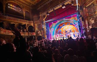 A crowd enjoying a show at Hackney Empire