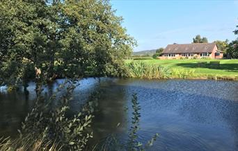 Views across the water towards Newton Meadows Cottages