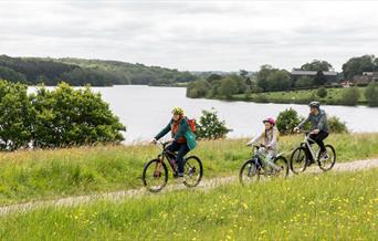 Family enjoying a bike ride at Staunton Harold