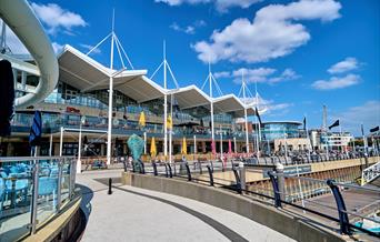 Gunwharf Quays Shopping Centre with a background of blue sky