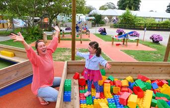Child with playing with giant lego at Aldingbourne Country Centre