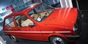 A red car on display at Coventry Transport Museum