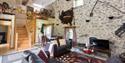 Sitting room showing the stairs at  Asheston Eco Barns