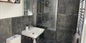 shower in the bathroom at Sparham Hall Farm Holidays
