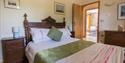Double bed at Asheston Eco Barns