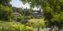 Green and scenic views over National Trust Quarry Bank on a summers day