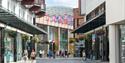 Shoppers walking through the Princesshay Shopping Centre