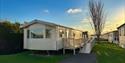 Adapted caravan with wheelchair ramp in the sunshine at Beverley Holidays