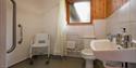 woodcombe cottages accessible bathroom with shower seat