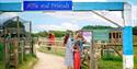 A family entering the animal area of Fairytale Farm