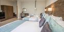 Bedroom with adapted beds and hoist at Marsham Court Hotel