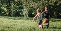 Children running through Wyre Forest  credit - Forestry England