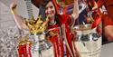 A child with trophys at LFC Stadium Tours & Experience