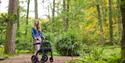 woman using Rollz mobility rollator
