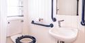 Accessible toilet with hand rails at Beverley Holidays