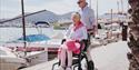 woman using Rollz mobility rollator