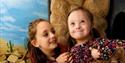 Children enjoying the caves at Eureka!