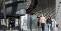 a couple walking through the indoor exhibit at Imperial War Museum Duxford