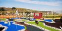 Accessible mini golf on the seafront at Caban