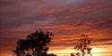 Sunset over Stubcroft Farm Campsite view