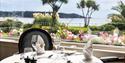 Table set for dinner at St Brelade’s Bay Hotel overlooking the sea