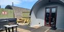 Lady Heyes Holiday park decking area with picnic tables