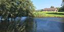 Views across the water towards Newton Meadows Cottages