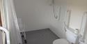 woodcombe cottages wet room with shower chair