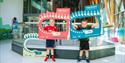 two children with dinosaur boards at Herbert Art Gallery & Museum