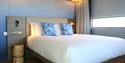Double bed at HEX Hotel at Yorkshire Wildlife Park